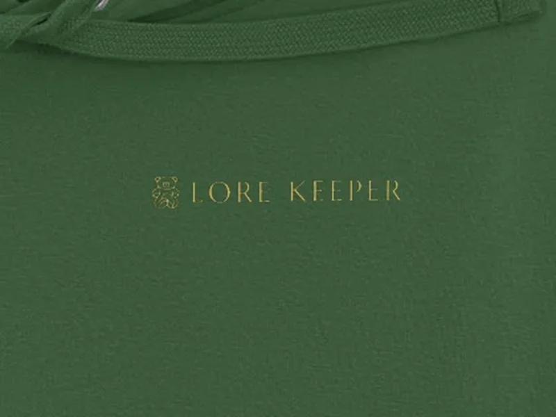Close-up: Lore Keeper Hoodie, logo on the fabric